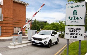 Car exiting barrier at Arden Hotel